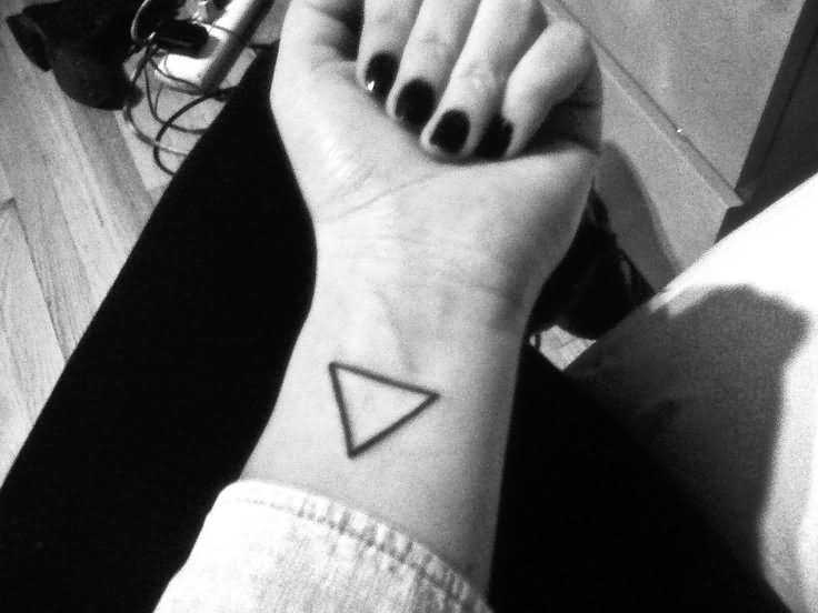 Black Outline Triangle Tattoo On Girl Wrist