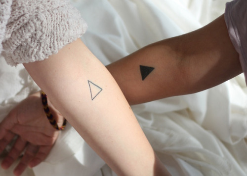 Black Triangle Tattoo On Couple Wrist