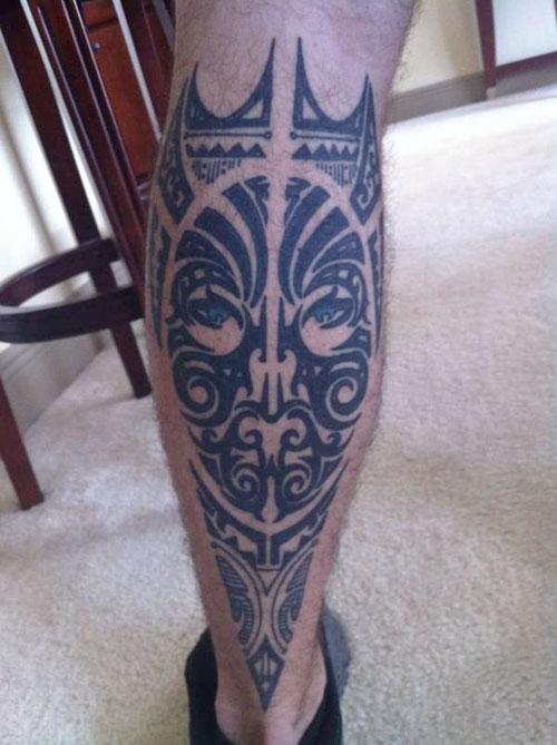 Black Tribal Mask Leg Tattoo On Leg Calf
