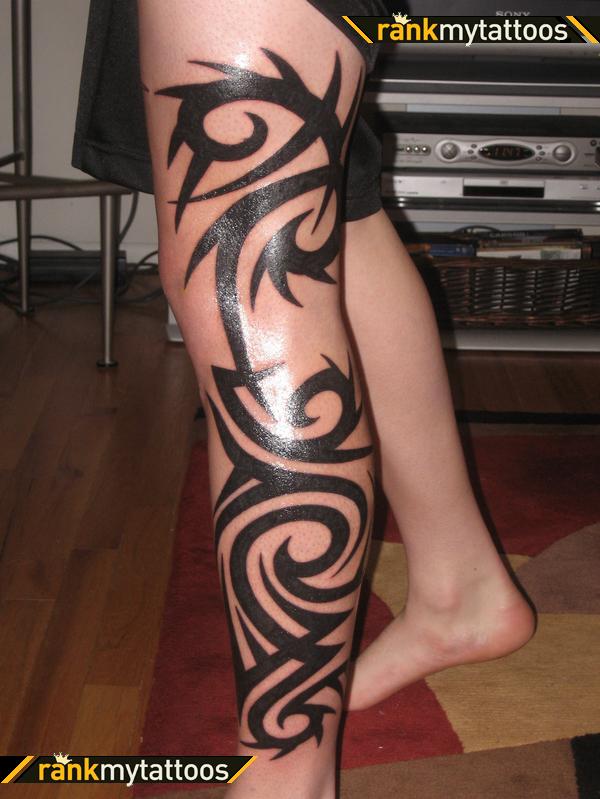 Black Tribal Tattoo On Left Full Leg