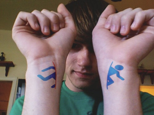 Blue Color Video Game Tattoos On Wrist