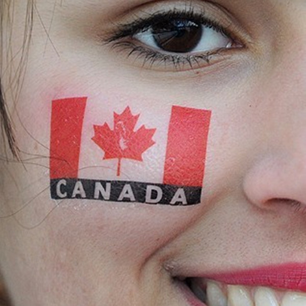 Canada International Flag Tattoo On Girl Face