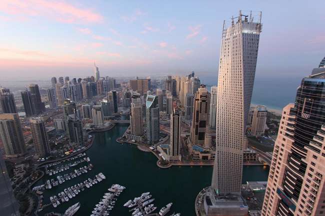 https://www.askideas.com/media/41/Cayan-Tower-Worlds-Twisted-Building-In-Dubai.jpg