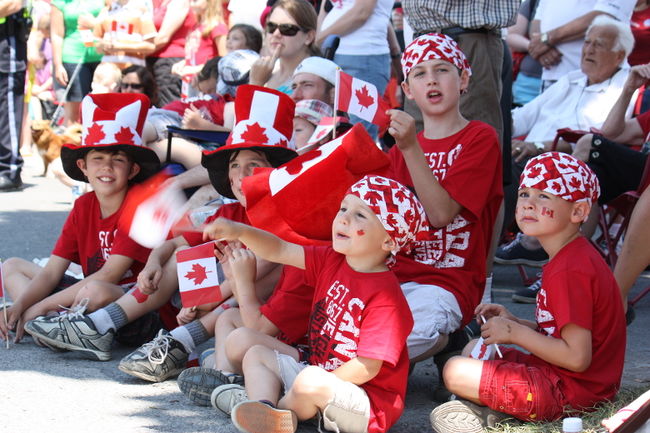 Children Enjoying The Canada Day Parade