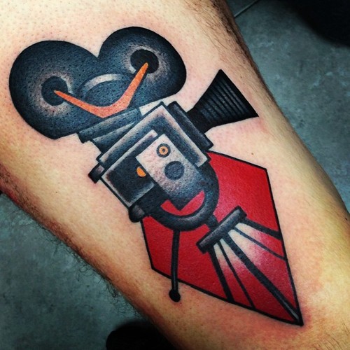 Colored Cinema Tattoo On Arm