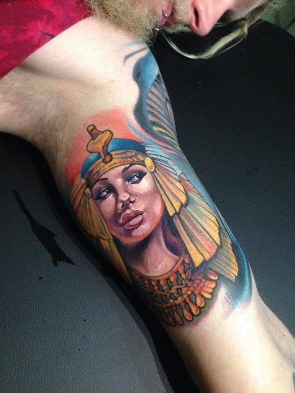 Colored Egyptian Queen Tattoo On Bicep by Fabian de Gaillande