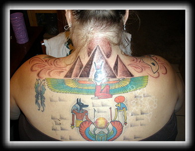 Colored Egyptian Tattoo On Girl Upper Back