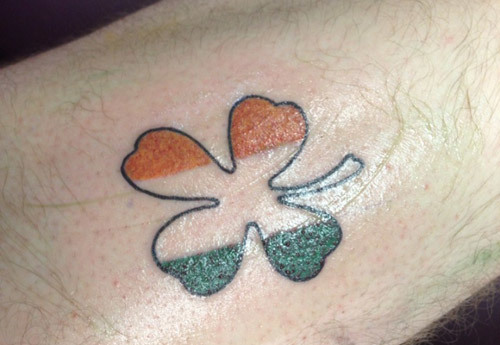 Colored Irish Flag In Four Leaf Tattoo