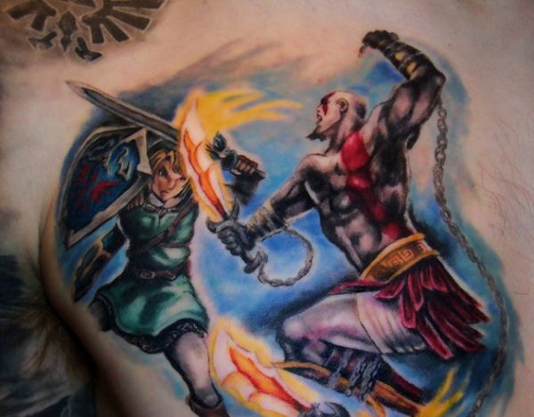 Colored Video Game Tattoo On Man Chest
