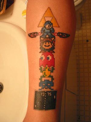 Colorful Animated Video Game Tattoo On Leg