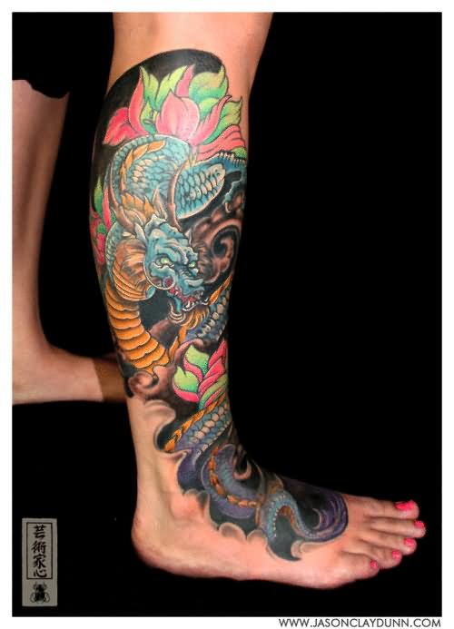 Colorful Dragon Tattoo On Girl Right Leg
