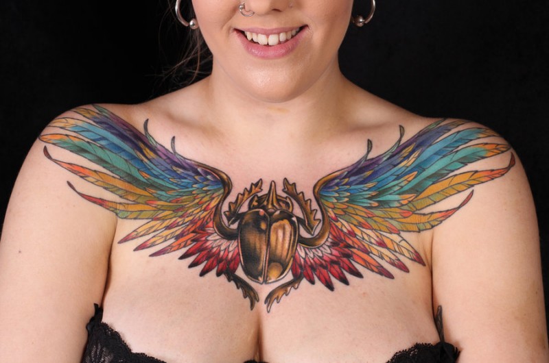 Colorful Egyptian Tattoo On Girl Chest