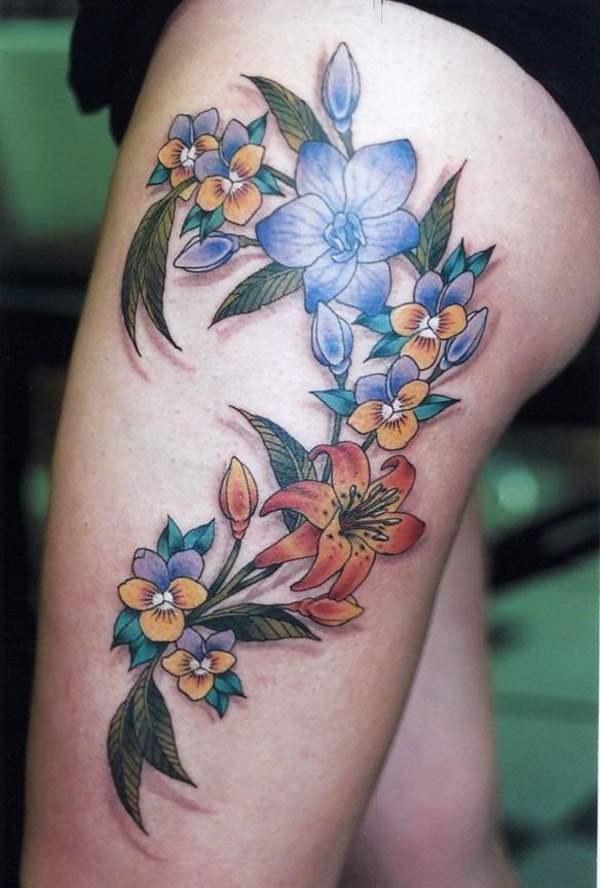 Colorful Flowers Tattoo On Left Upper Leg