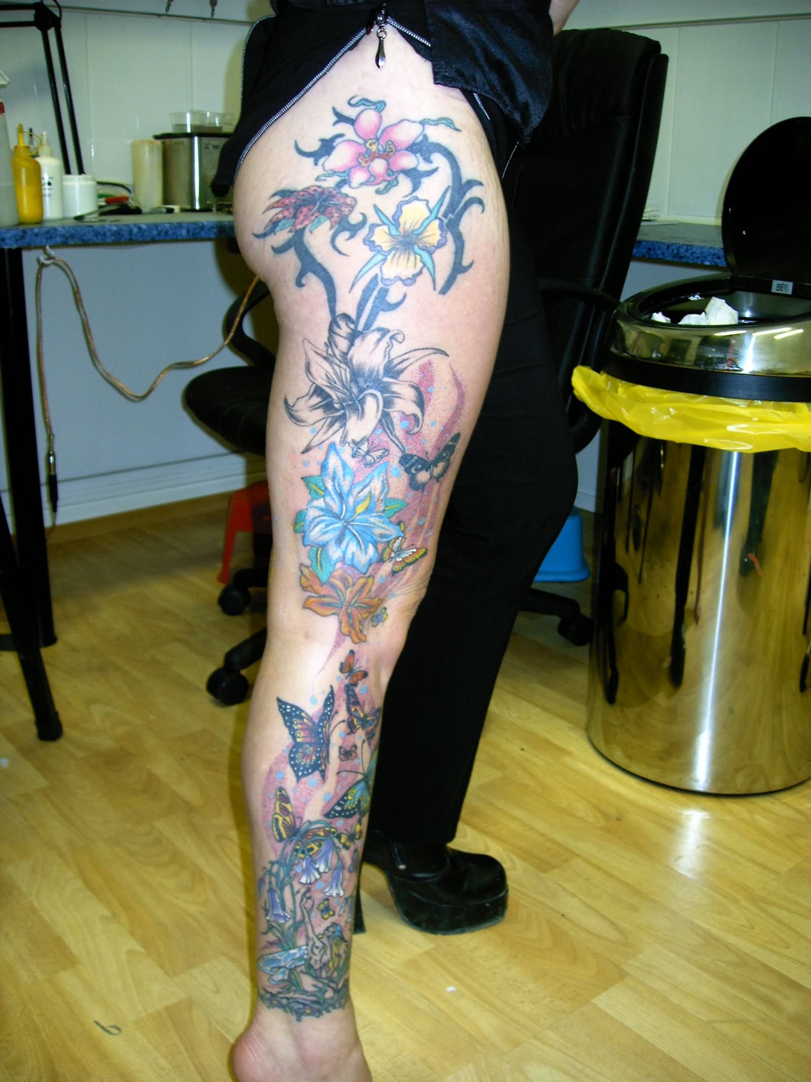Colorful Flowers With Butterflies Tattoo On Right Full Leg