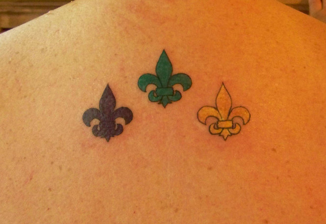 Colorful Small Fleur De Lis Tattoos On Upper Back