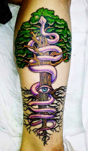 Colorful Tree With Snake Tattoo On Leg