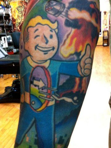 Colorful Video Game Tattoo On Leg