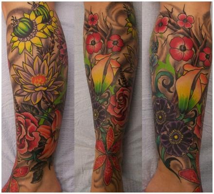 Cool Colorful Flowers Tattoo On Leg