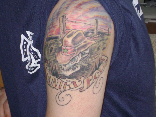 Country Boy Tattoo On Left Shoulder