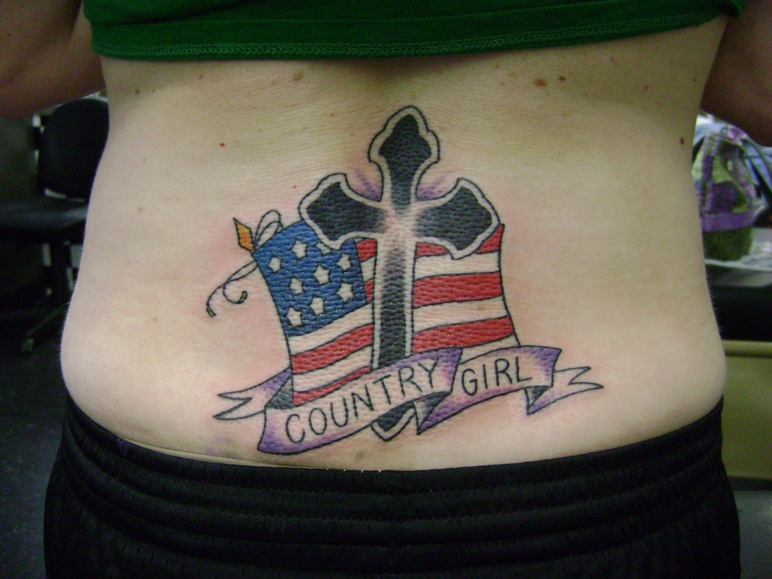 Cross And Country Girl Tattoo On Lower Back