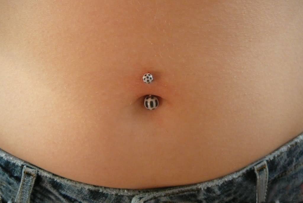 Cute Belly Piercing With Black And White Barbell