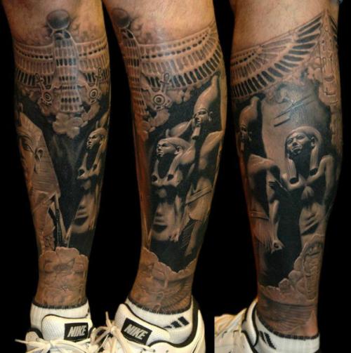 Dark Ink Egyptian Tattoo On Leg
