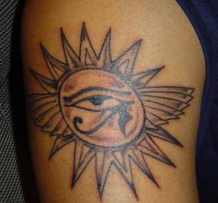 Egyptian Horus Eye In Sun Tattoo On Shoulder