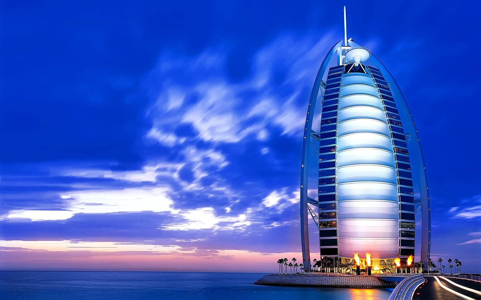 Exterior View Of The Burj Al Arab During Sunset