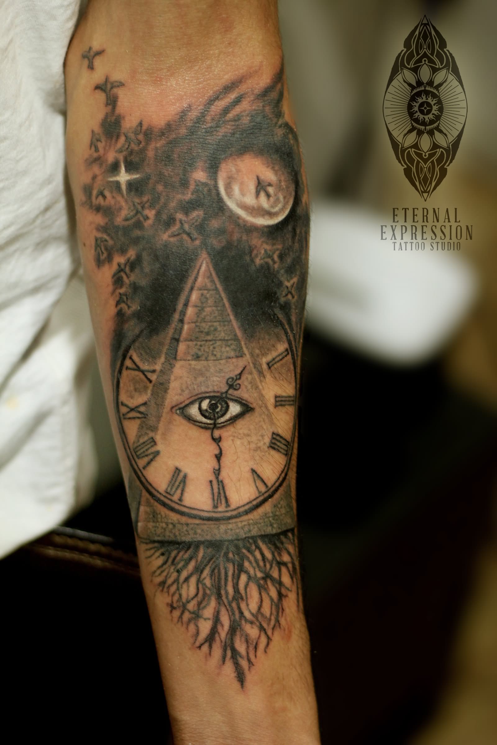 Eye In Pyramid With Clock Tattoo Design For Forearm