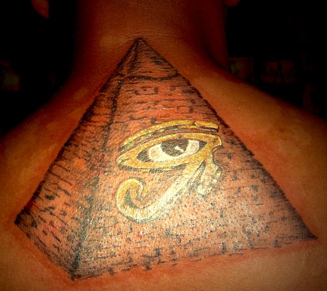 Eye Of Horus In Pyramid Tattoo On Upper Back