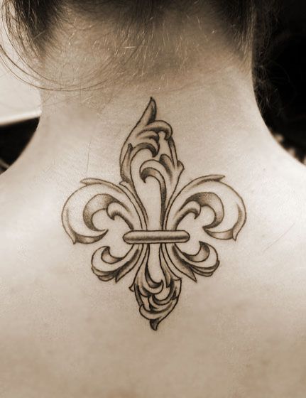 Fleur De Lis Tattoo On Girl Upper Back
