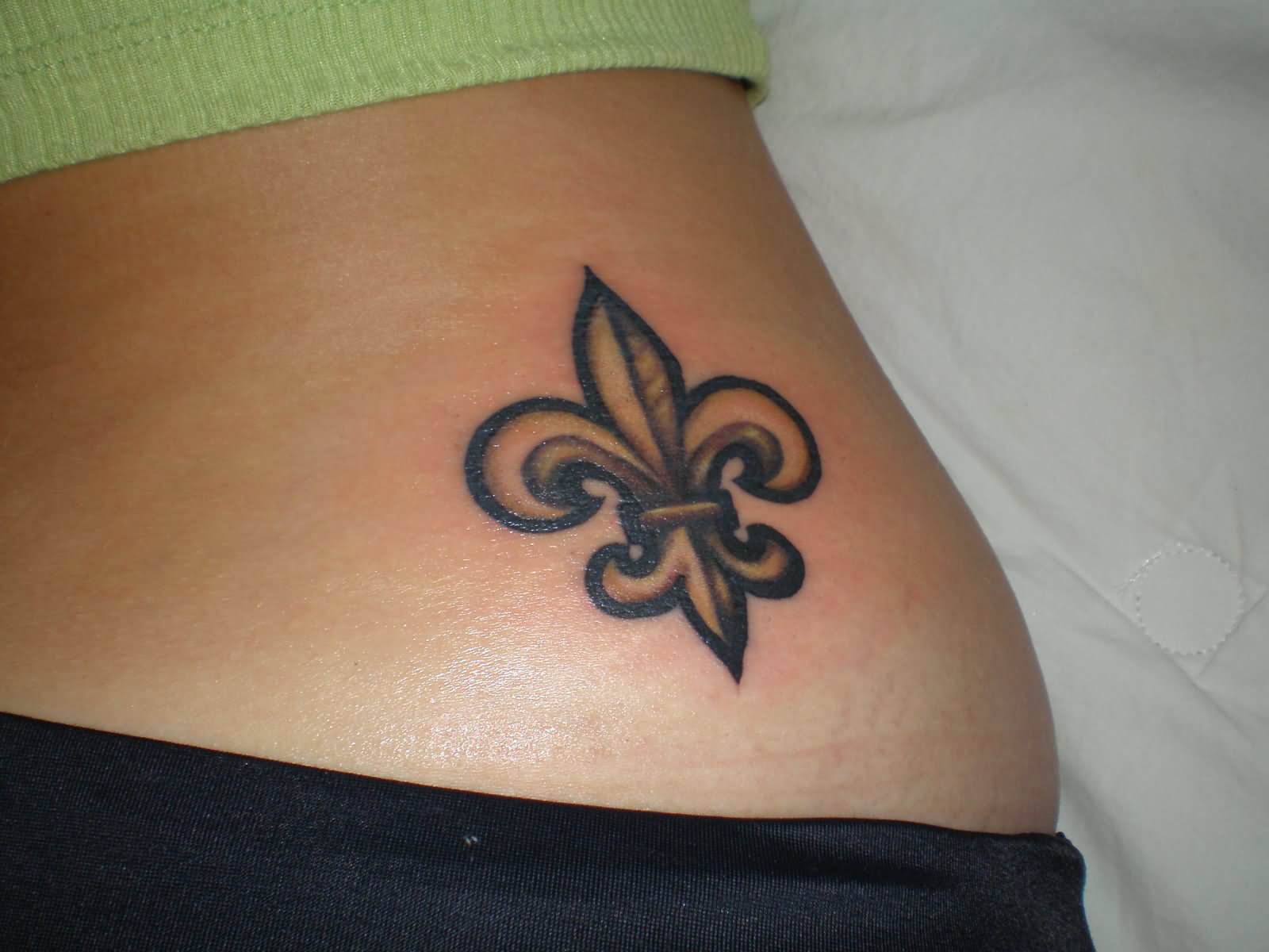 Fleur De Lis Tattoo On Lower Back
