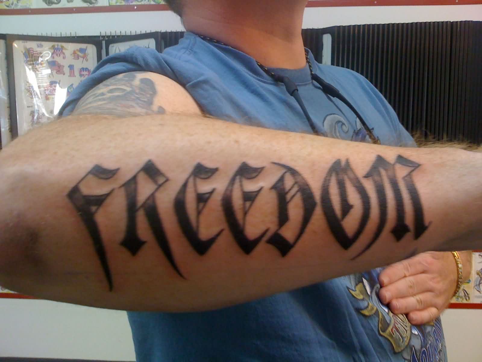 Freedom Word Tattoo On Right Forearm