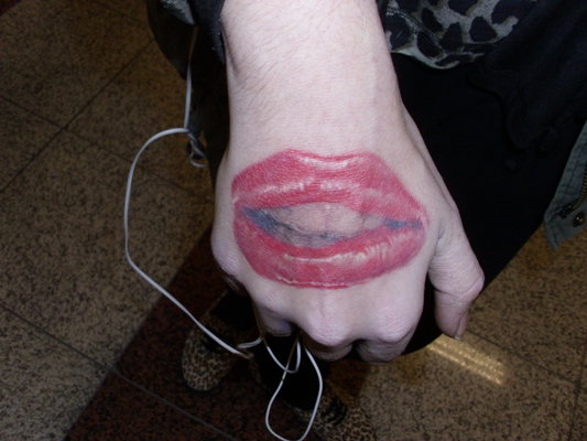 Funky Lip Print Tattoo On Hand