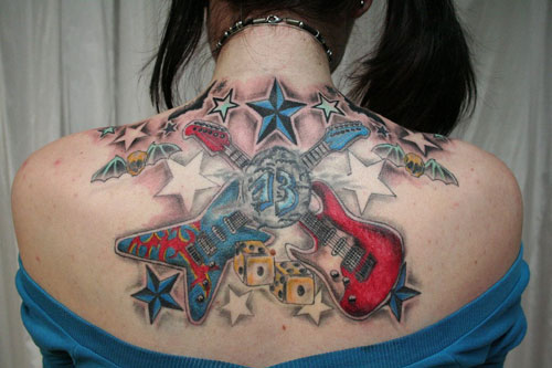 Funky Two Guitar Tattoo On Girl Upper Back