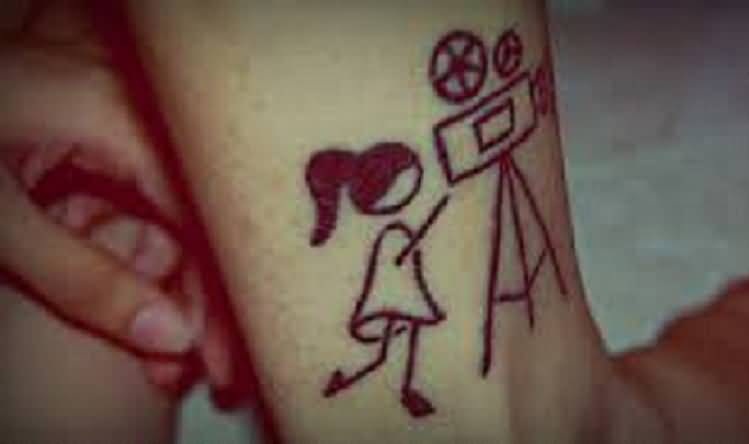 Girl With Camera Cinema Tattoo