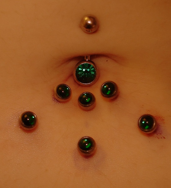 Green Studs Belly Piercing Picture