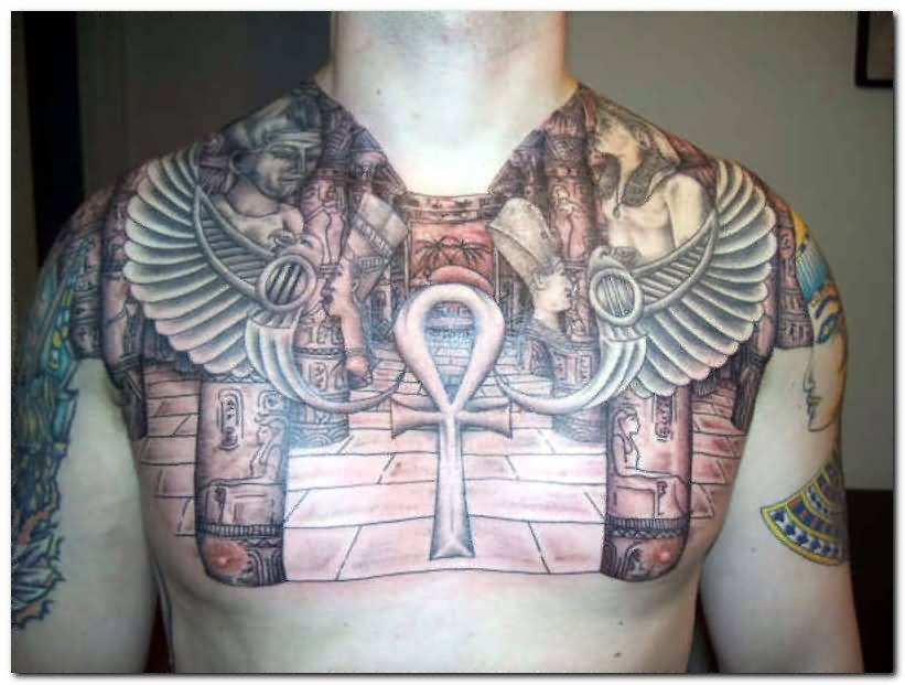 Grey Ankh And Egyptian Tattoo On Man Chest