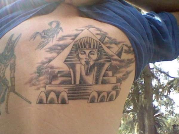 Grey Egyptian Tattoo On Right Back Shoulder