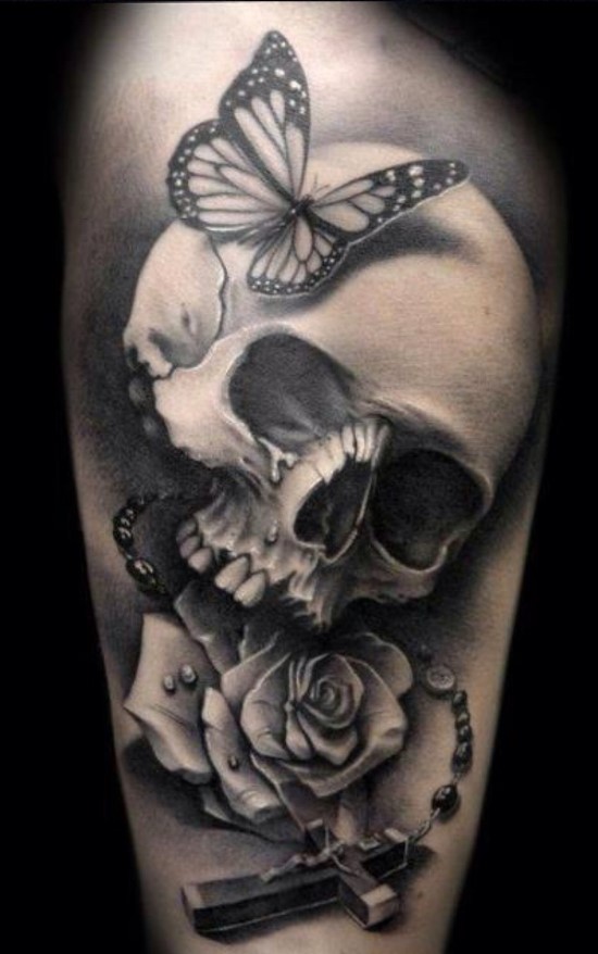 Grey Ink 3D Skull With Rose And Butterfly Tattoo Design For Leg