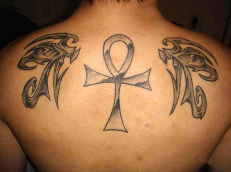 Grey Ink Ankh And Egyptian Tattoos On Back Shoulder