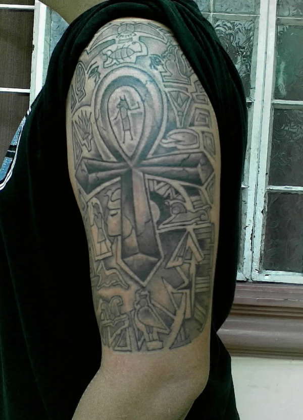 Grey Ink Ankh Egyptian Tattoo On Left Half Sleeve