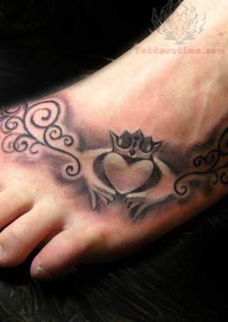 Grey Ink Crown Heart Irish Tattoo On Left Foot