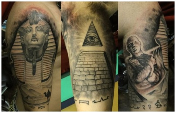Grey Ink Egyptian Tattoo On Bicep