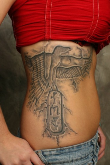 Grey Ink Egyptian Tattoo On Rib Side
