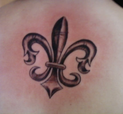 Grey Ink Fleur De Lis Tattoo On Upper Back