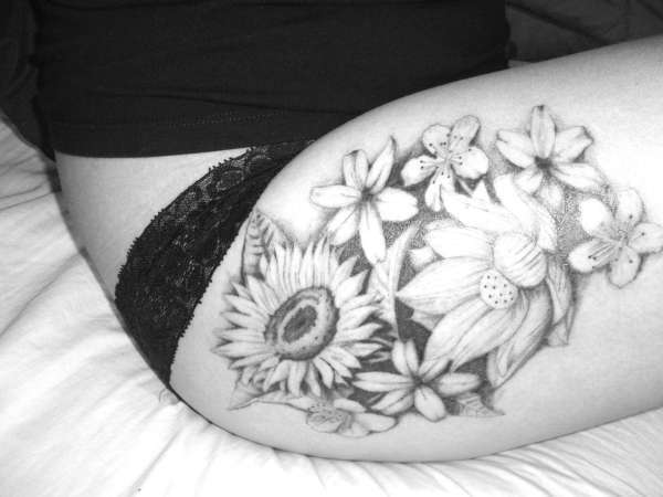 Grey Ink Flowers Tattoo On Girl Right Upper Leg