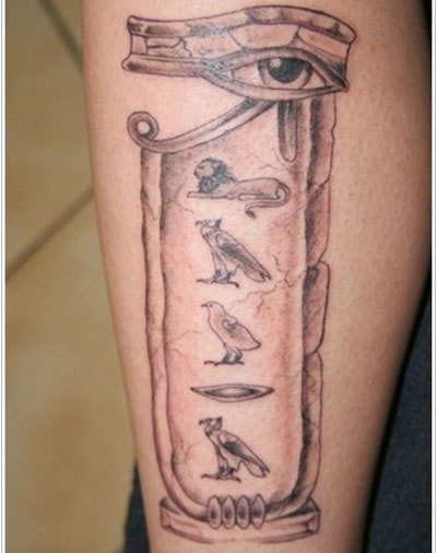 Grey Ink Horus Eye Egyptian Tattoo On Leg