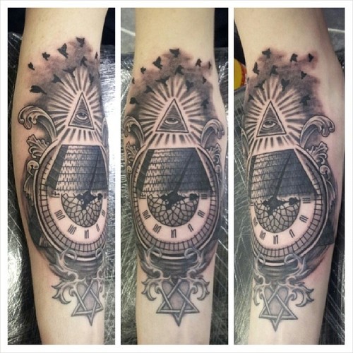 Grey Ink Illuminati Eye Pyramid With Clock Tattoo Design For Sleeve