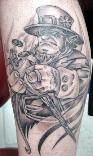 Grey Ink Irish Tattoo On Leg